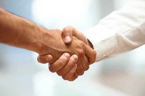 Handshake on white background