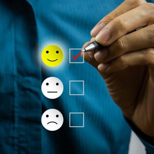 conceptual-the-customer-responded-to-the-survey-the-client-using-hand-choose-happy-face-smile-icon-on_t20_VL8Wo6